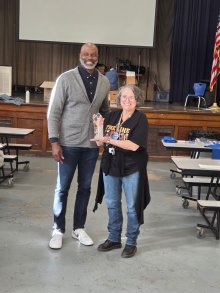 AFT Michigan President Terrence Martin awards the 75 year award to HFT President Toni Coral